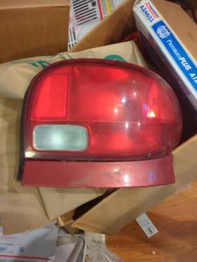 166-60242r Passenger Right Tail Light Fits 95-01 Swift Geo Metro