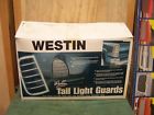 39-3250 Westin Chrome Tail Light Guards Chevrolet Envoy 707742432501