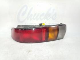 166-58439l General Motors - Foreign Driver Left Tail Light Fits 90-93 Storm 266608