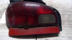 166-60243l General Motors - Foreign Driver Left Tail Light Fits 95-01 Swift 512537