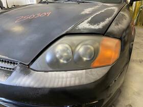 114-58981l Hyundai Driver Left Headlight Fits 03-04 Tiburon 1903942