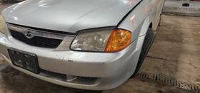 114-59997l Mazda Driver Left Headlight Fits 99-00 Protege 1184301