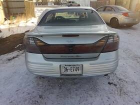 166-01049a Pontiac Tail Light Lid Mounted Se Fits 00-05 Bonneville 308037