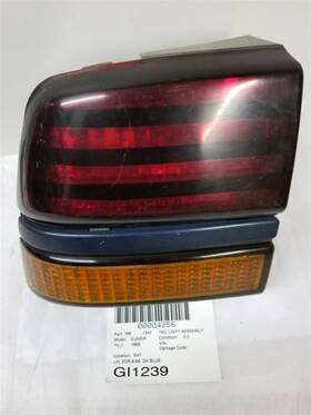 166-01340l Pontiac Sunbird 1988-1991 Left Tail Light Quarter Panel Mounted