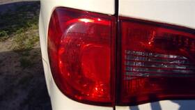 166-51053l Volkswagen Driver Left Tail Light Quarter Panel Mounted Fits 09-14 Routan 92681
