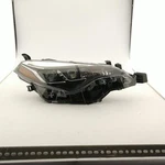 Headlight For Corolla Oem Assy Spot In Lens Right. Fixed Price $319.99.