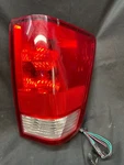 2004-2015 Nissan Titan Passenger Rh Side Rear Brake Tail Light W/utility Box Oem. Fixed Price $58.00.
