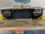 1999-2002 Lincoln Continental License Plate Panel And Back Up Lights Oem Part. Fixed Price $90.00.