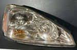 Passenger Right Headlight Xenon Hid Fits 04-05 Sienna 10200426. Fixed Price $200.00.