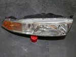 1999-01 Mitsubishi Galant Oem Front Right Head Lamp Light W Bulb Part 9221-0107. Fixed Price $30.00.
