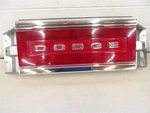 Dodge Dynasty 1988-1993 Us Market Center Taillight Panel Chrome Nameplate. Fixed Price $65.00.