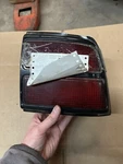 Passenger Right Tail Light 2 Door Quarter Mounted Fits 88-90 Chevrolet Cavalier. Fixed Price $30.00.
