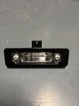 Genuine Ford License Lamp 8T5Z-13550-B. Fixed Price $28.88.