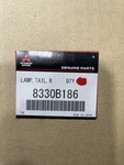 Genuine Mitsubishi Tail Lamp Assembly 8330B186. Fixed Price $325.00.