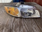 Passenger Right Headlight Fits 00 Dodge Caravan. Fixed Price $39.99.