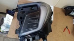 Yukon 2025 Driver/left Headlight 448136. Fixed Price $825.00.