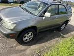 Driver Headlight Without Xenon Chrome Backing Fits 99-03 Lexus RX300 574966. Fixed Price $129.89.