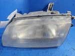Driver Left Headlight Fits 97-98 Mazda Protege 9486. Fixed Price $42.00.