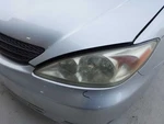 Driver Left Headlight Chrome Trim Fits 02-04 Camry 3217023. Fixed Price $123.40.