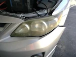 Driver Left Headlight With Black Trim Fits 11-13 Corolla 2490554. Fixed Price $155.00.