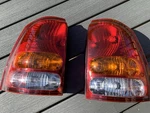 Pair 2002-2004 Oldsmobile Bravada Right & Left Side Tail Light Assembly Rainier. Fixed Price $169.99.