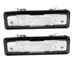 For E12 E23 E24 E28 E30 E36 Pair Set Of License Plate Lights Hella H23331011. Fixed Price $31.95.