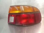 91 92 Escort R. Tail Light Htbk Dr Gt Quarter Panel Mounted 1701. Fixed Price $28.00.