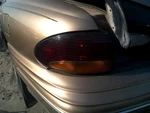 Driver Left Tail Light Quarter Panel Mounted Fits 96-99 Bonneville 371697. Fixed Price $49.61.