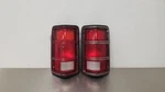 86 Dodge 100 Pickup Tail Light Lamp Set Pair Black Bezel. Fixed Price $108.38.