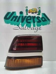 1990 Pontiac Sunbird Left Quarter Panel Mounted Tail Light. Fixed Price $65.50.