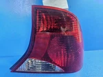 2002-2004 Ford Focus Passenger Right Tail Light Sedan Red Housing Oem. Fixed Price $40.00.