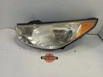 2010-2013 Hyundia Tucson Drivers Left Headlight Lens Housing 11034289. Fixed Price $154.83.