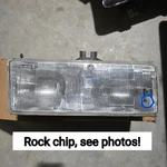 1989-1990 Deville Left Headlight Rock Chip On Glass, Small Hole See Photos! Oem. Fixed Price $79.99.