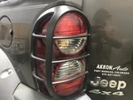 Driver Left Tail Light With Lamp Guard Fits 05-06 Liberty 2438136. Fixed Price $71.00.