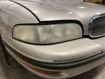 Passenger Right Headlight Without Cornering Lamps Fits 97-99 Lesabre 2040570. Fixed Price $125.00.