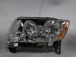 Driver Headlight Halogen Laredo Fits 11-13 Grand Cherokee 348223. Fixed Price $100.87.