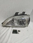 Driver Left Headlight Fits 92-95 Civic 373688. Fixed Price $45.00.