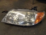 2001 Mazda Protege Driver Side Headlight. Fixed Price $62.00.