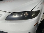 Driver Headlight Halogen Gloss Black Background Fits 06-08 Mazda 2032666. Fixed Price $150.00.