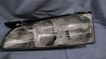 Driver Left Headlight With Black Edge Fits 92-93 Bonneville 151673. Fixed Price $75.00.