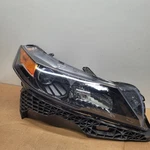 Passenger Right Headlight Fits 2012-2014 Acura Tl. Fixed Price $140.00.