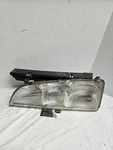 Driver Left Headlight With Black Edge Fits 92-93 Bonneville 21642. Fixed Price $100.00.
