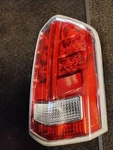 Passenger Right Tail Light Base Fits 2011-2012 Chrysler 300. Fixed Price $119.00.