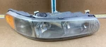 1997 2005 Buick Century Front Right Passenger Side Headlight 114-01539AR Oem. Fixed Price $41.99.