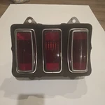 1969 Ford Mustang Oem Tail Light With Bezel Original. Fixed Price $59.99.