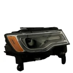 Headlight For Grand Cherokee Oem Assy Right Spot In Lens. Fixed Price $649.99.