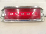 Dodge Dynasty 1988-1993 Us Market Center Taillight Panel Chrome Nameplate. Fixed Price $75.00.
