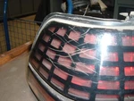 Driver Left Tail Light Checkered Lens Fits 89 Grand Prix 233126. Fixed Price $62.50.