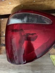 Right Side (passenger) Taillight Housing 01-03 Caravan. Fixed Price $29.00.