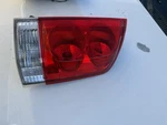 Passenger Right Tail Light Thru 12/04 Fits 04-05 Armada 1338359. Fixed Price $49.00.